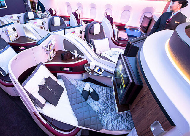 Airbus A350 business class: reclined bed, TV, amenities.