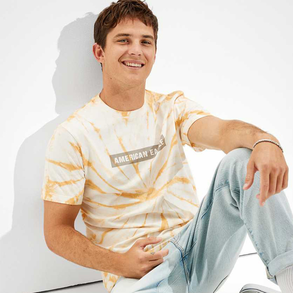 Person in American Eagle tie-dye shirt smiling.