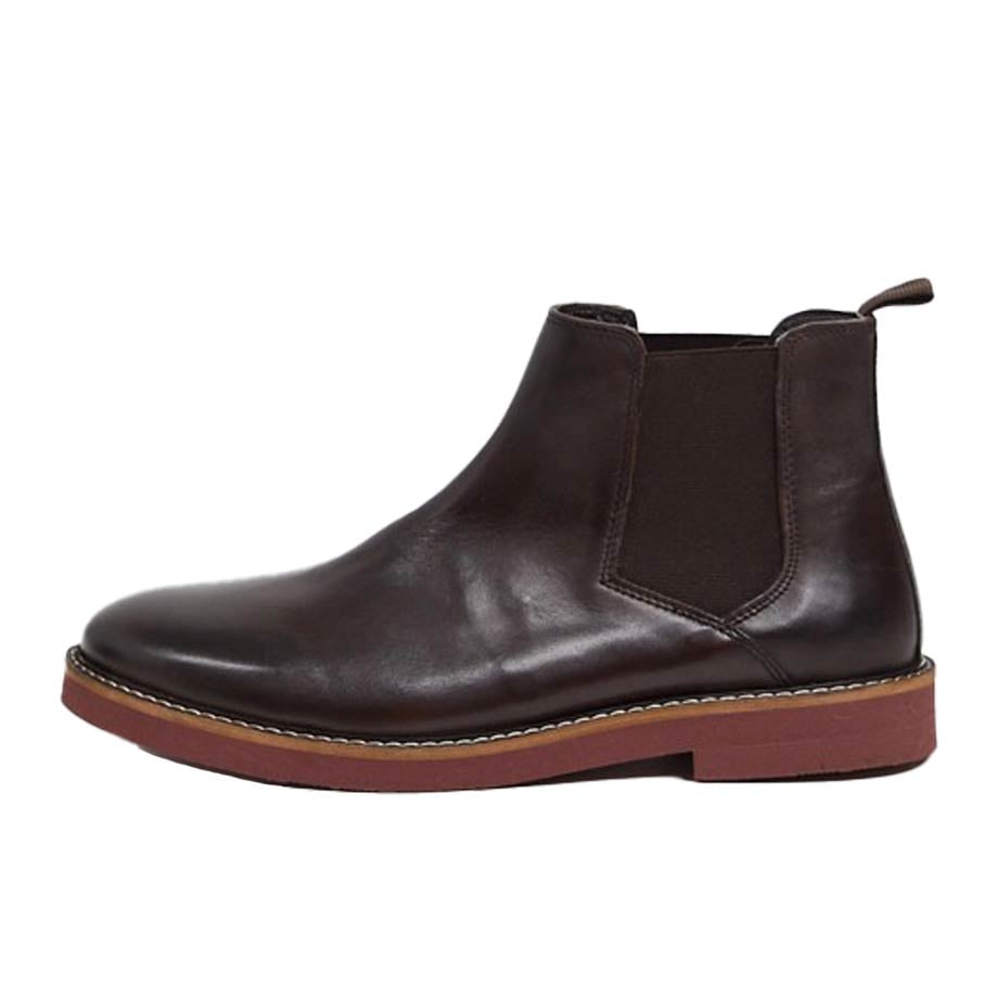 Dark brown leather Chelsea boot with contrast sole.
