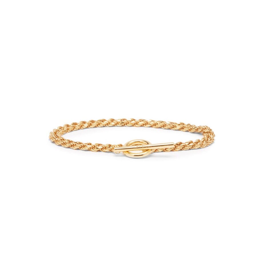 Men's gold twisted bracelet with toggle clasp.