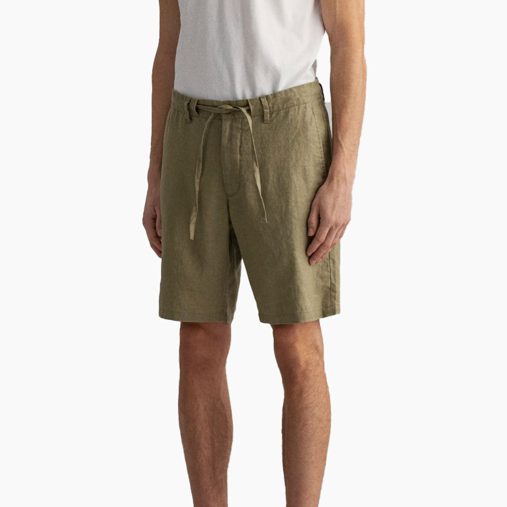 Man wearing cargo shorts and white tee.