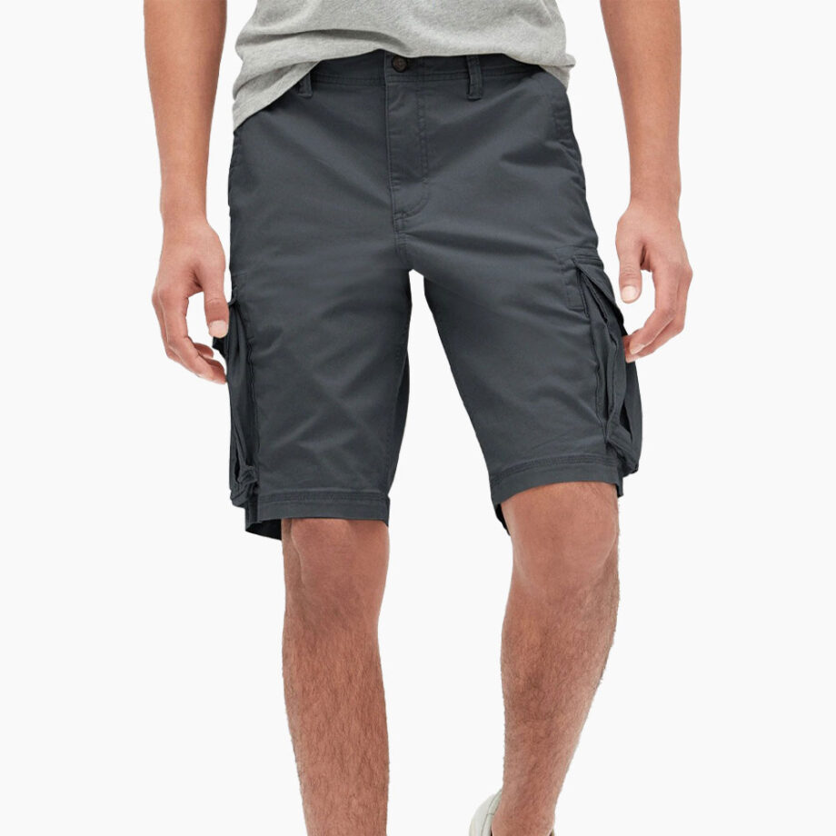 Person in gray tee and cargo shorts.