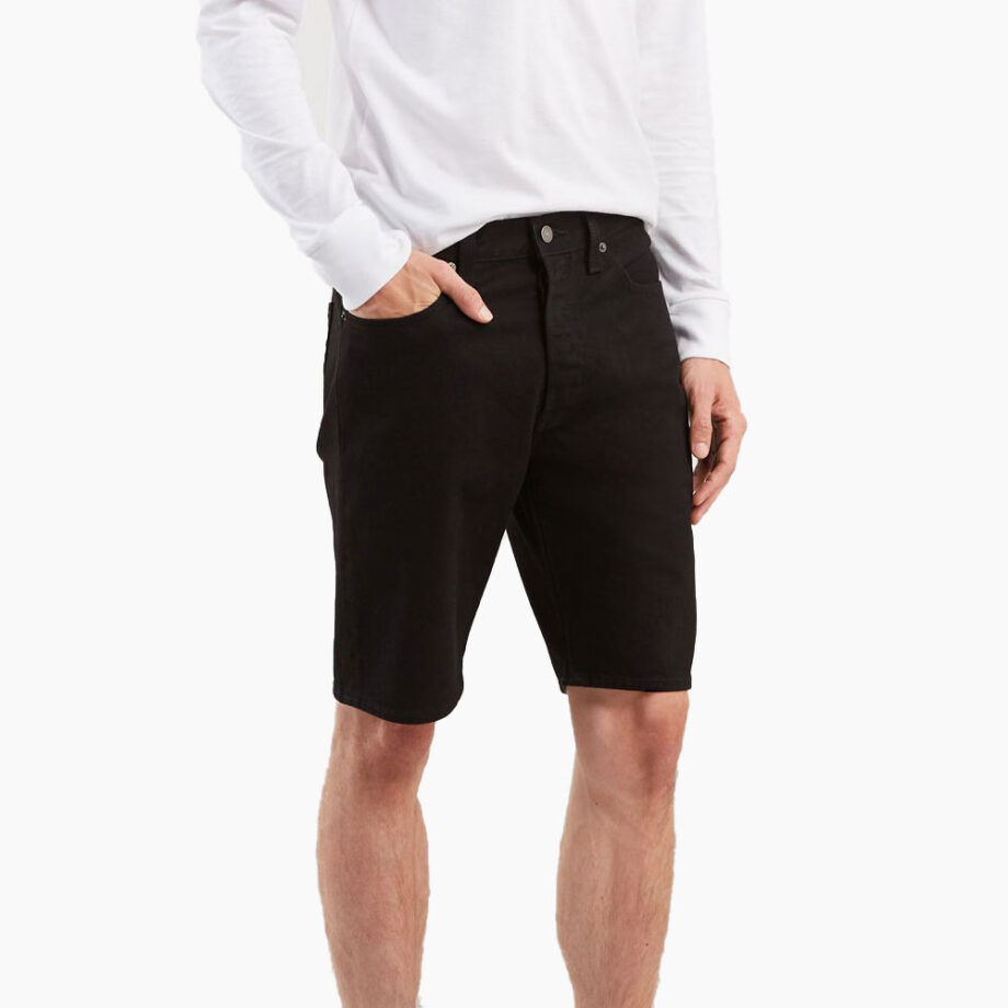 Person wearing white shirt, cargo shorts casually.