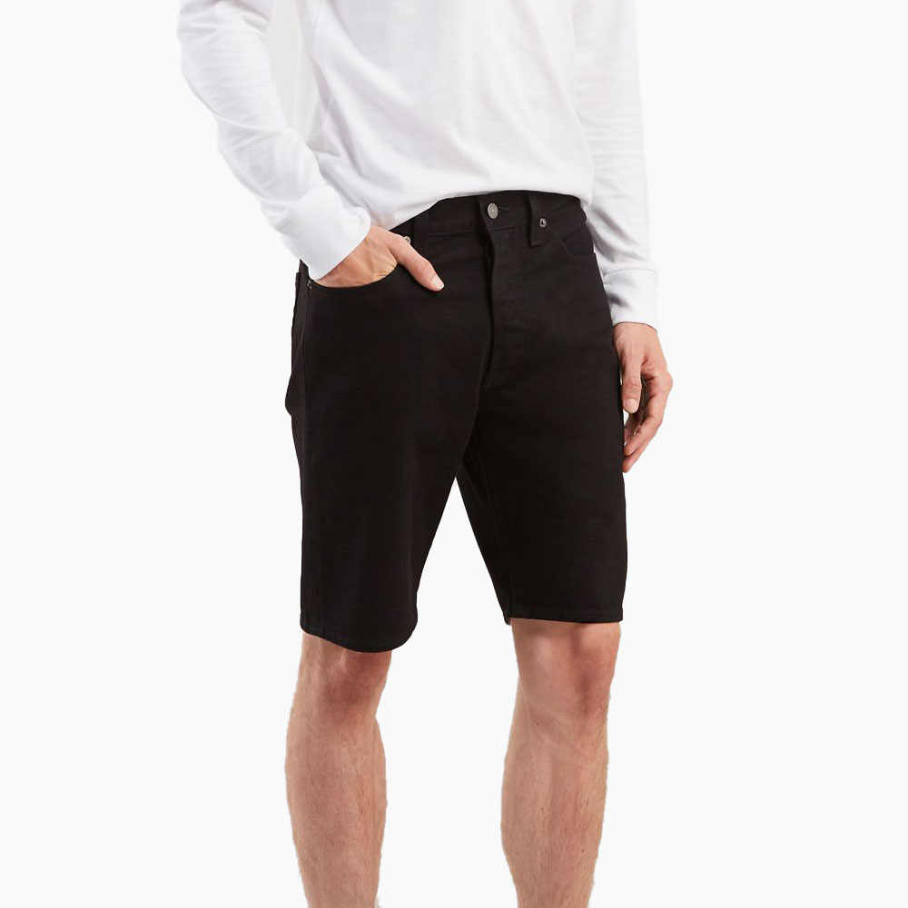 Person wearing white shirt, cargo shorts casually.