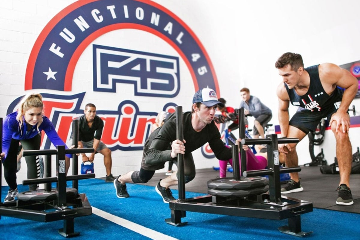 People exercise at F45 gym.