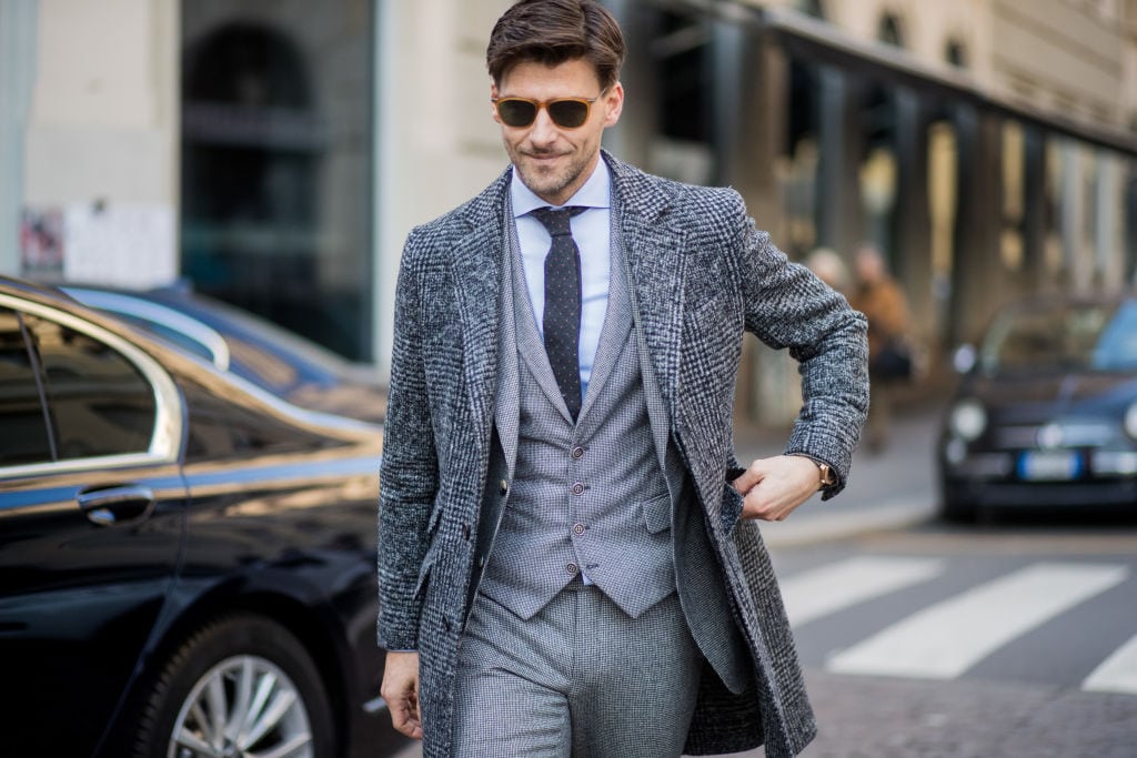 Stylish man in grey suit.