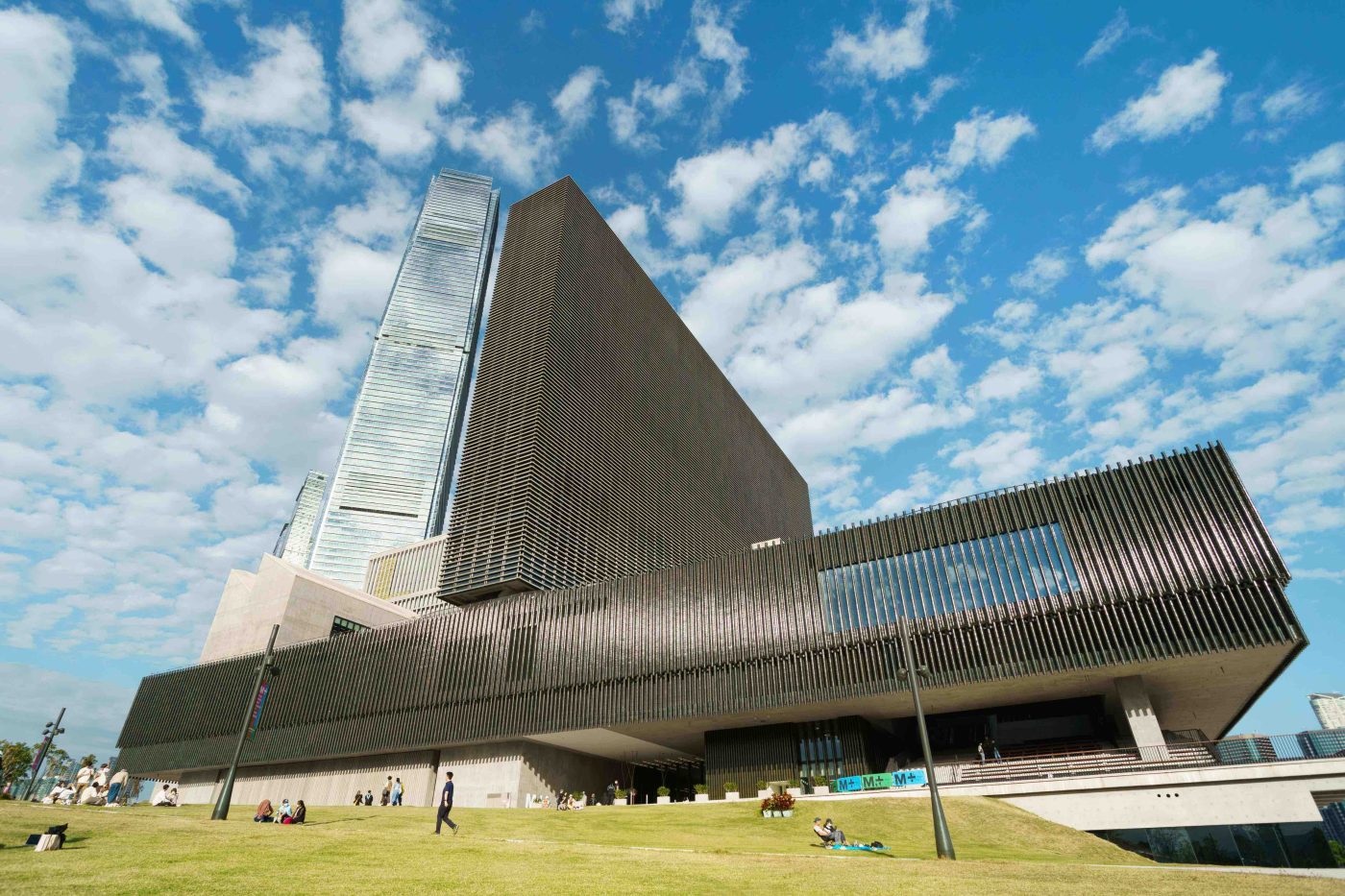 Exterior of M+ Museum in West Kowloon Cultural District at sunset.