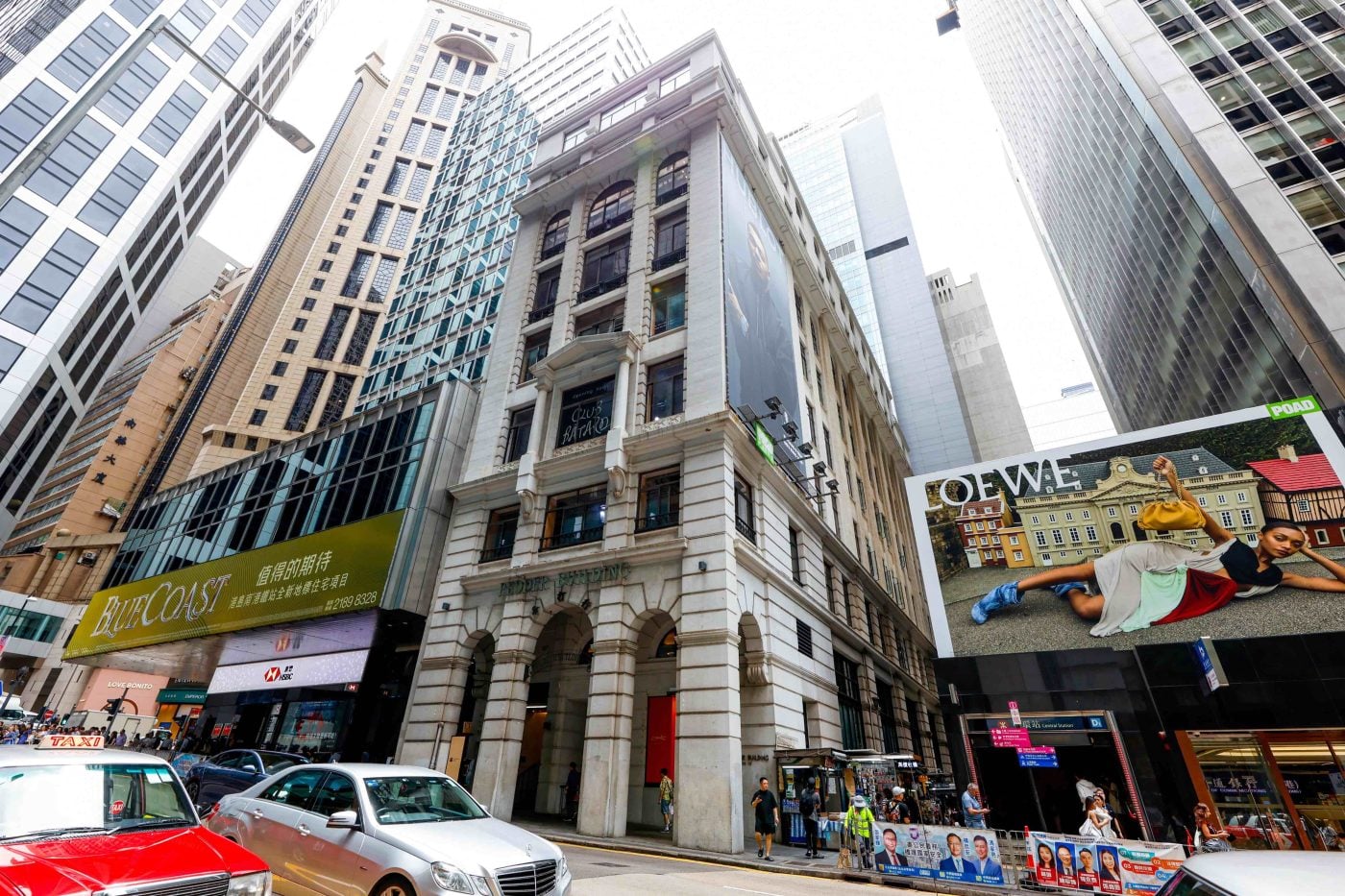 Historic Pedder Building exterior in Central, Hong Kong, home to luxury boutiques.