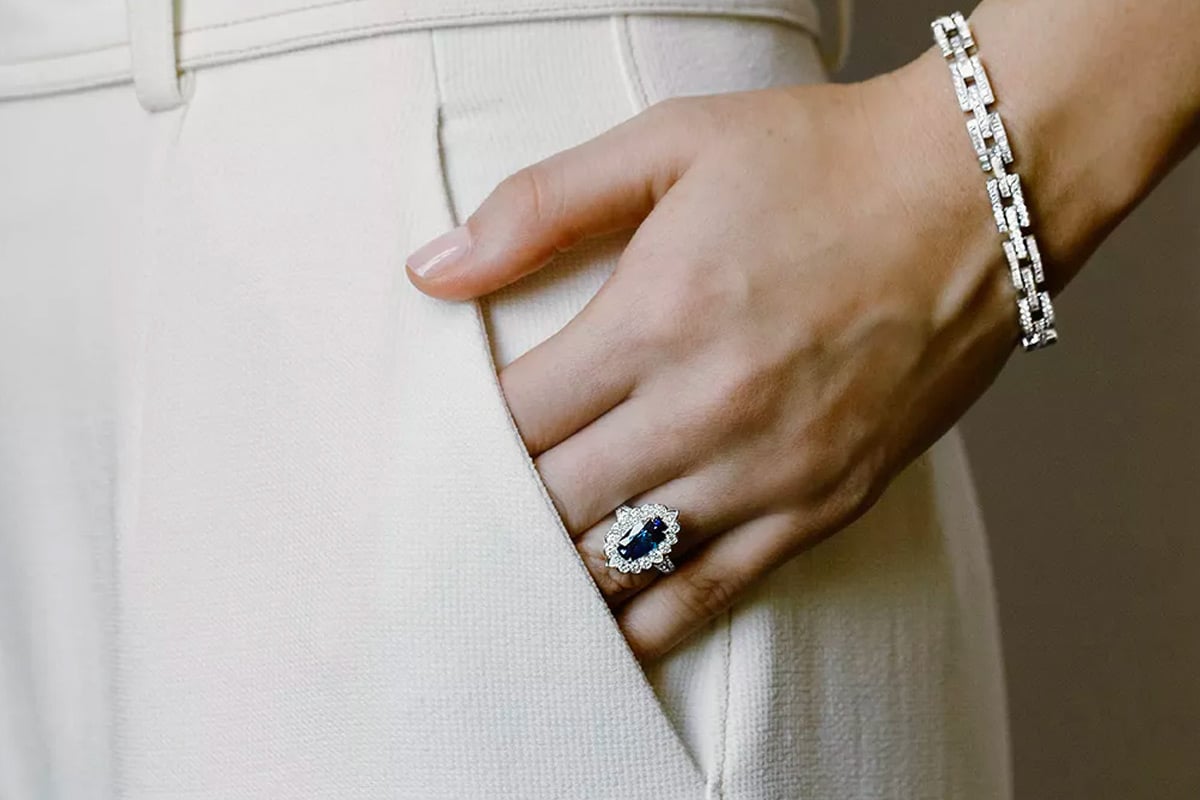 Person displays elegant jewelry.