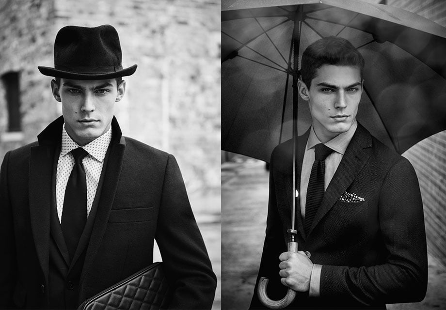 Dapper men in suits: polka dot shirt, hat, umbrella.