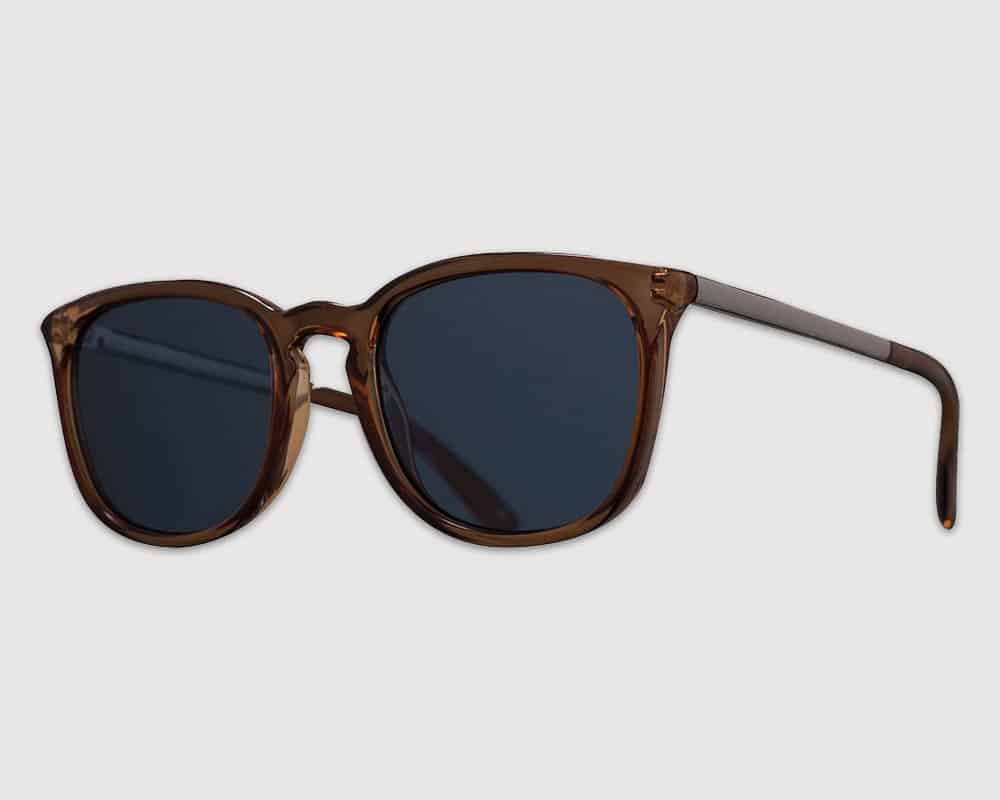 Chic brown sunglasses on gray.