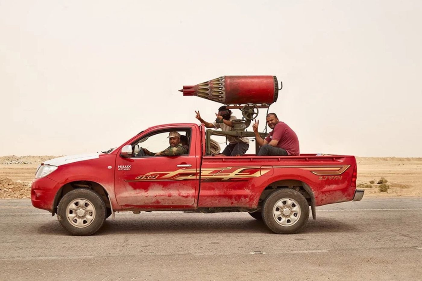 Toyota Hilux fitted with a MILAN anti-tank missile launcher in desert terrain. Image: James Mollison