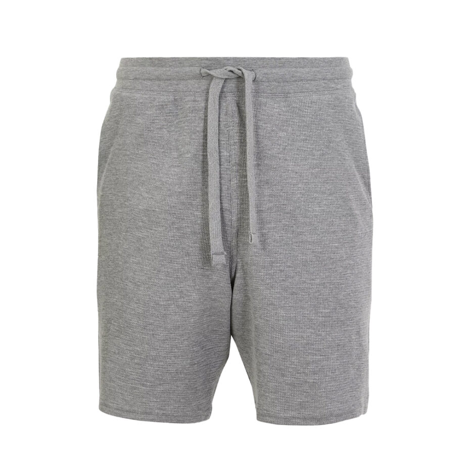 Knee-length ribbed gray knit lounge shorts.