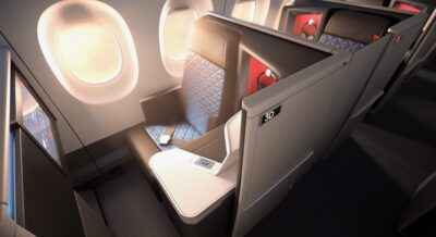 First-class airplane seat, luxurious, private.
