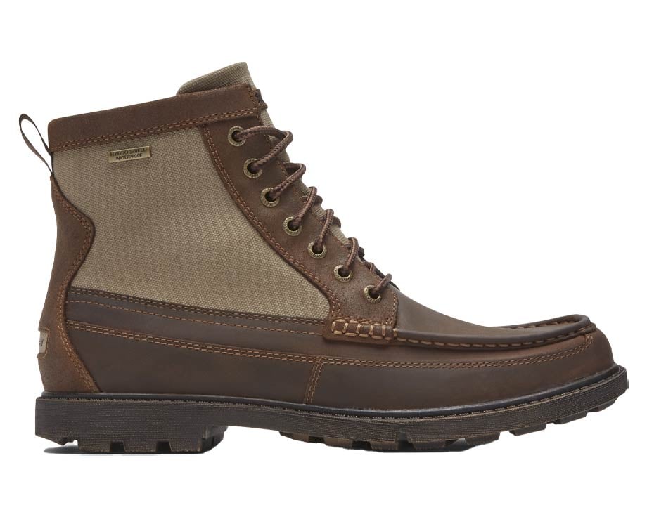 Men's winter boot with rugged sole. Leather and fabric materials.