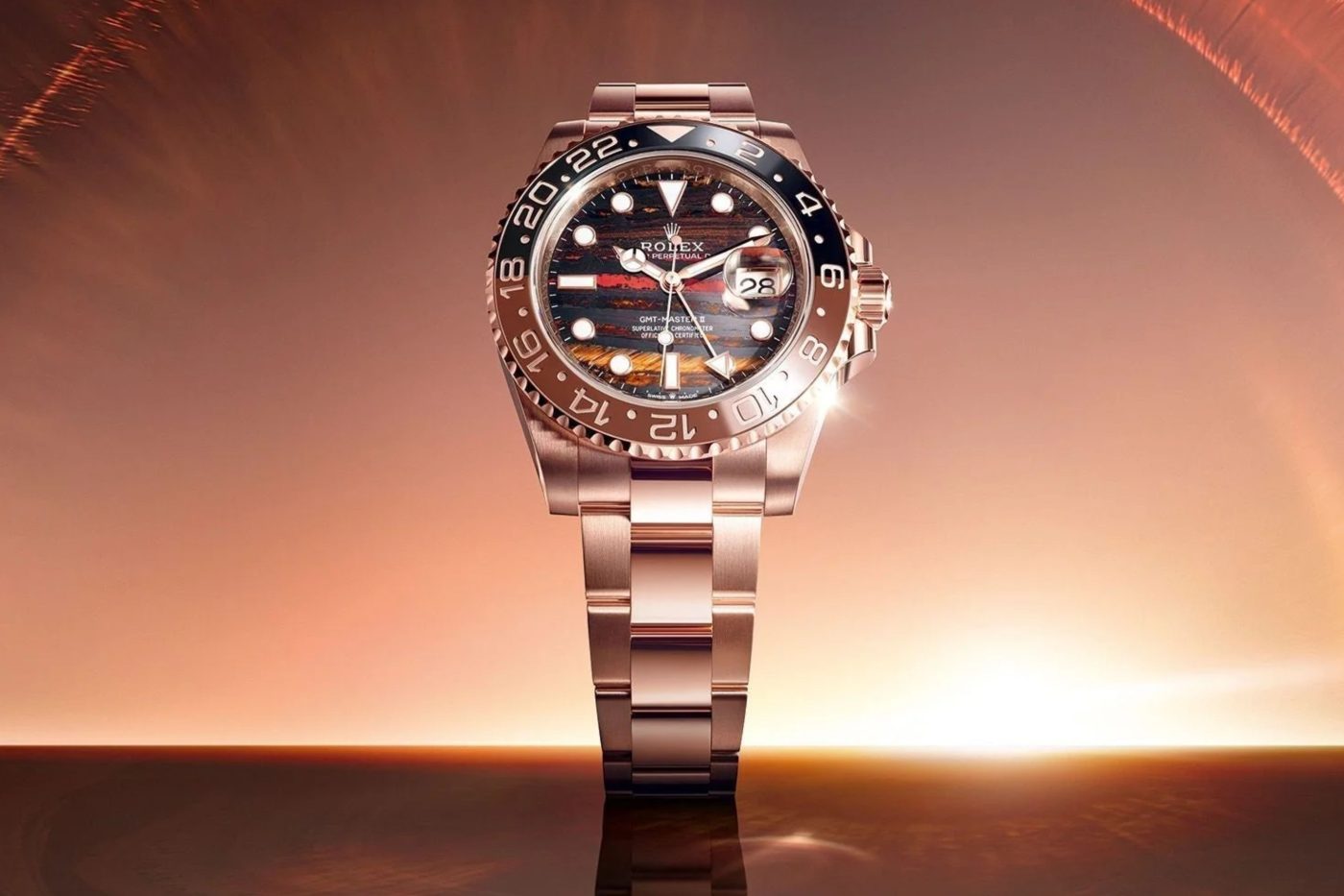 Rolex GMT-Master II 126715CHNR “Tiger Iron” with natural tiger’s-eye, red jasper and hematite stone dial in Everose gold case.