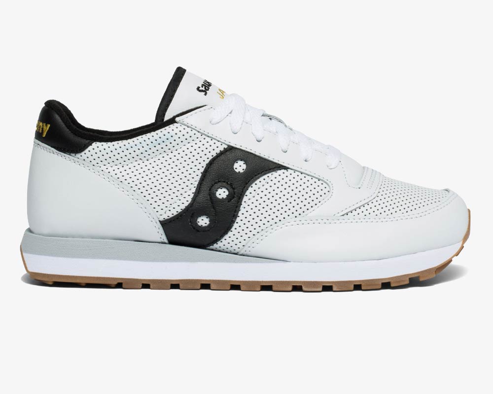 Men's sneaker with perforated detailing and gum outsole.