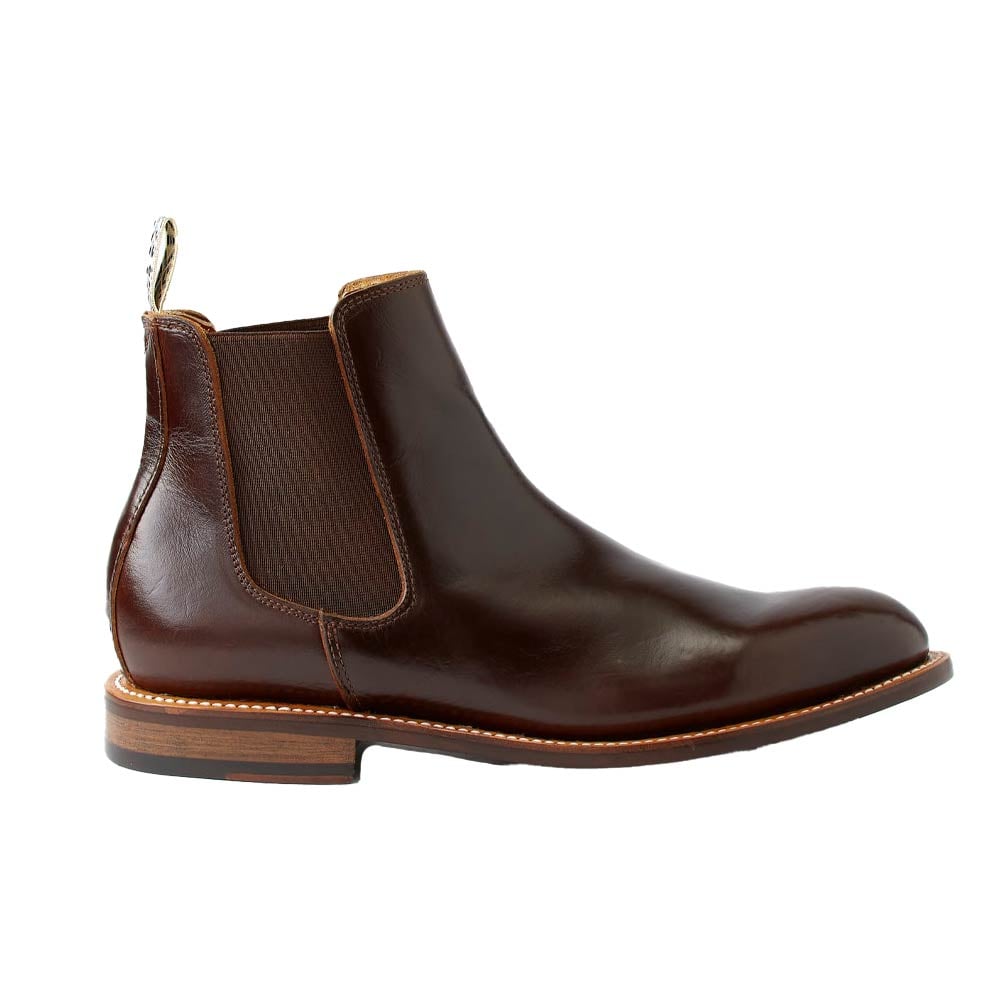 Men's brown leather Chelsea boot features.