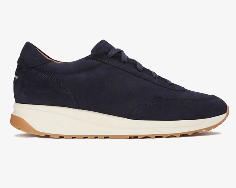 Men's dark blue suede sneaker with white sole.
