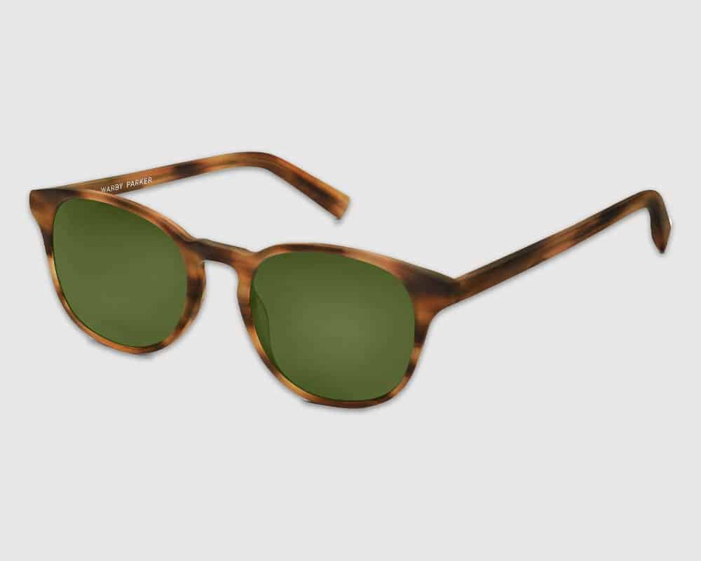 Tortoiseshell, green sunglasses, cheap vibe.