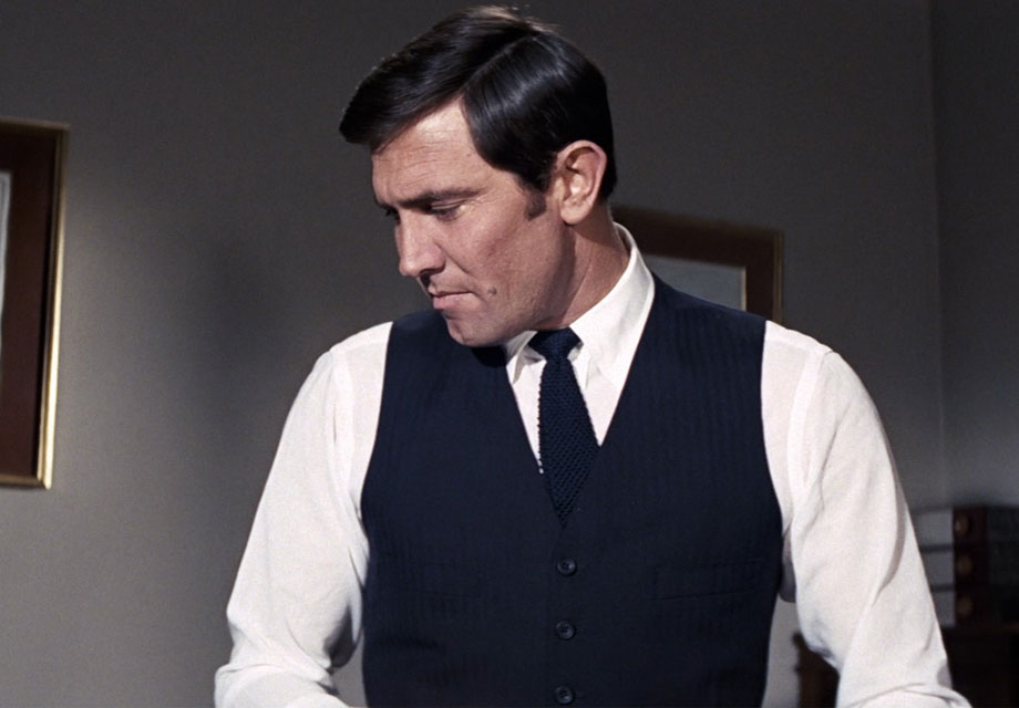 Man in suit, framed art.